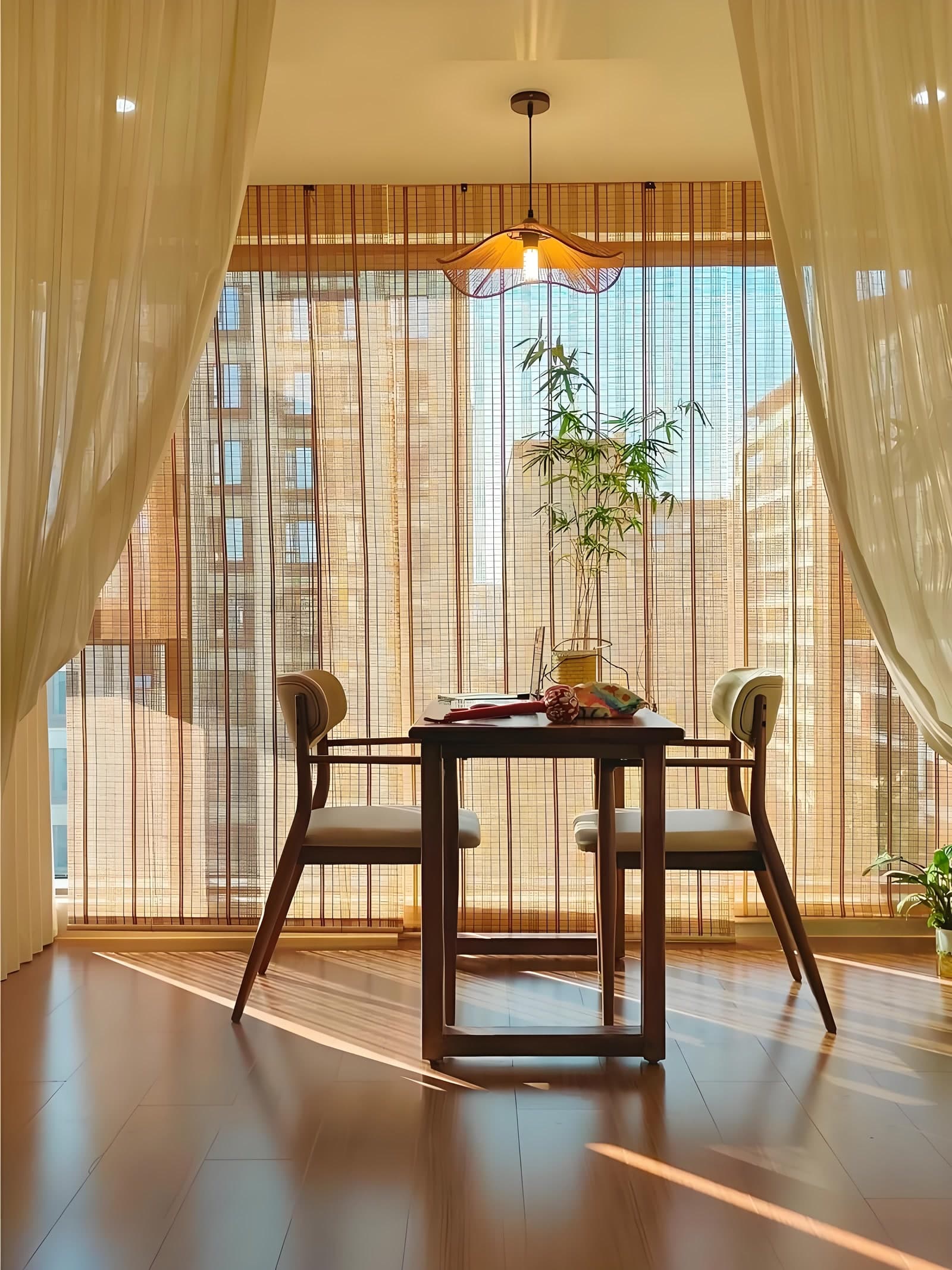 Bamboo blinds and lighting in a dining setting